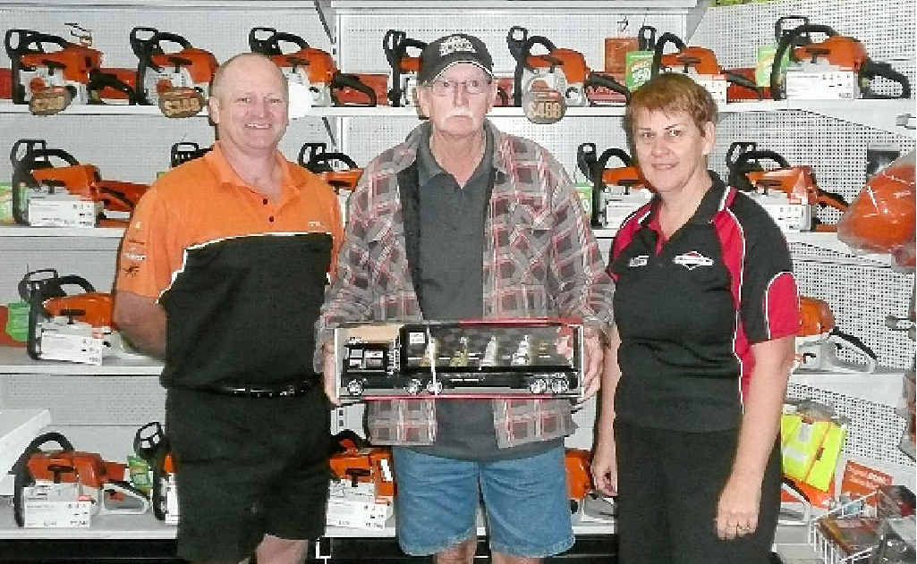Mr G. Purdy won a collectable truck from Ross and Robyn Honnery at the Gympie Mower Centre. Mr G. Purdy won a collectable truck from Ross and Robyn Honnery at the Gympie Mower Centre.